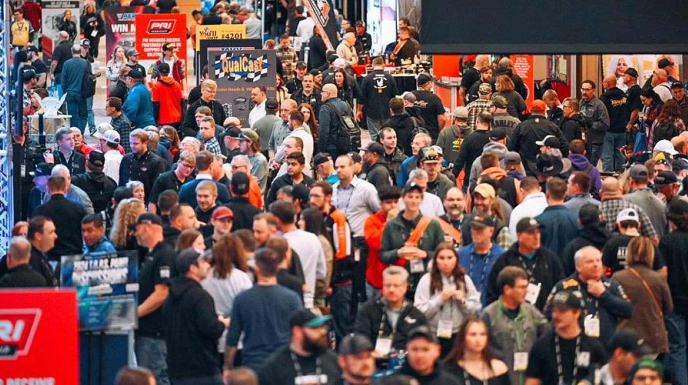 A crowded PRI Show hallway.