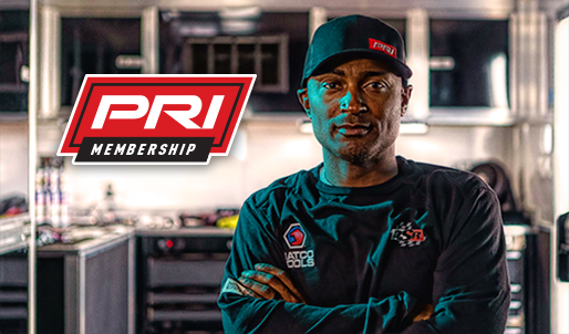PRI Membership logo, NHRA Drag Racer Antron Brown crossing his arms