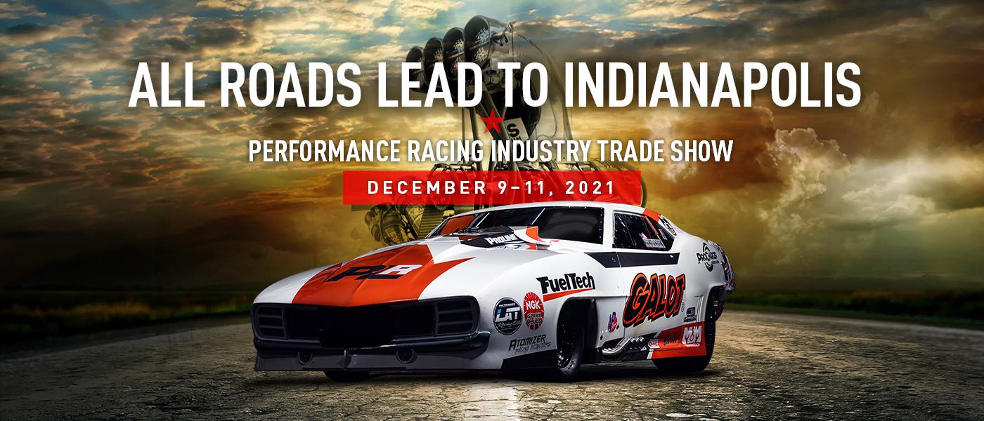 Copy that reads "All Roads Lead To Indianapolis. Performance Racing Industry Trade Show. December 9-11, 2021. Drag racing car in the foreground with high-performance racing engine in the background.