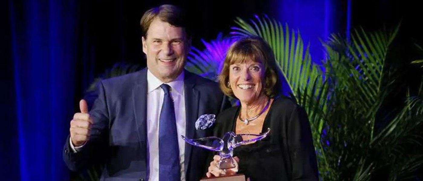 Photo of Jim Farley and Lyn St. James courtesy of Ford Performance