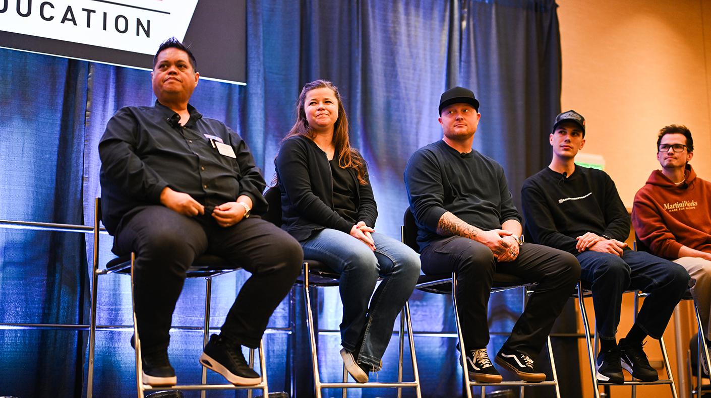 A PRI Education panel on stage.