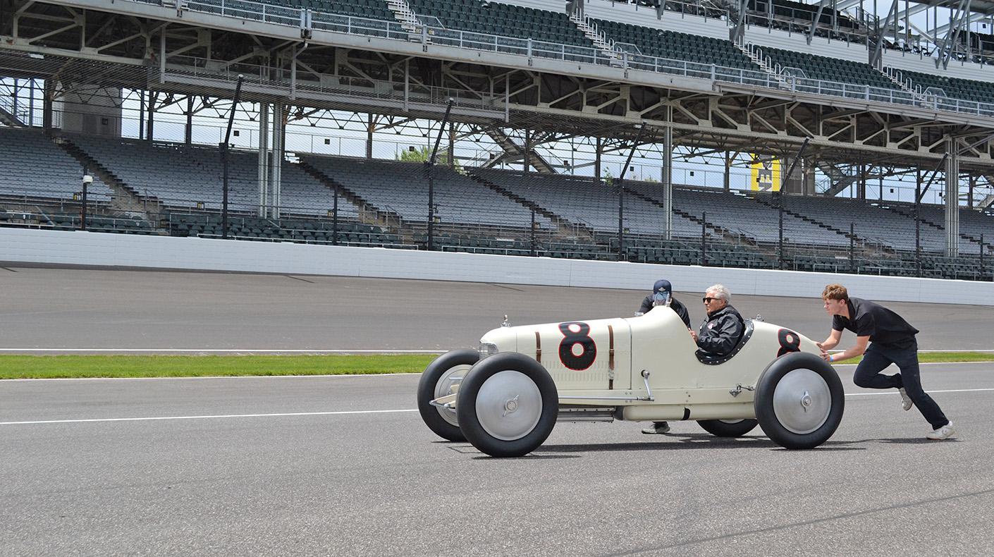 Mario Andretti in a vintage race car at IMS.