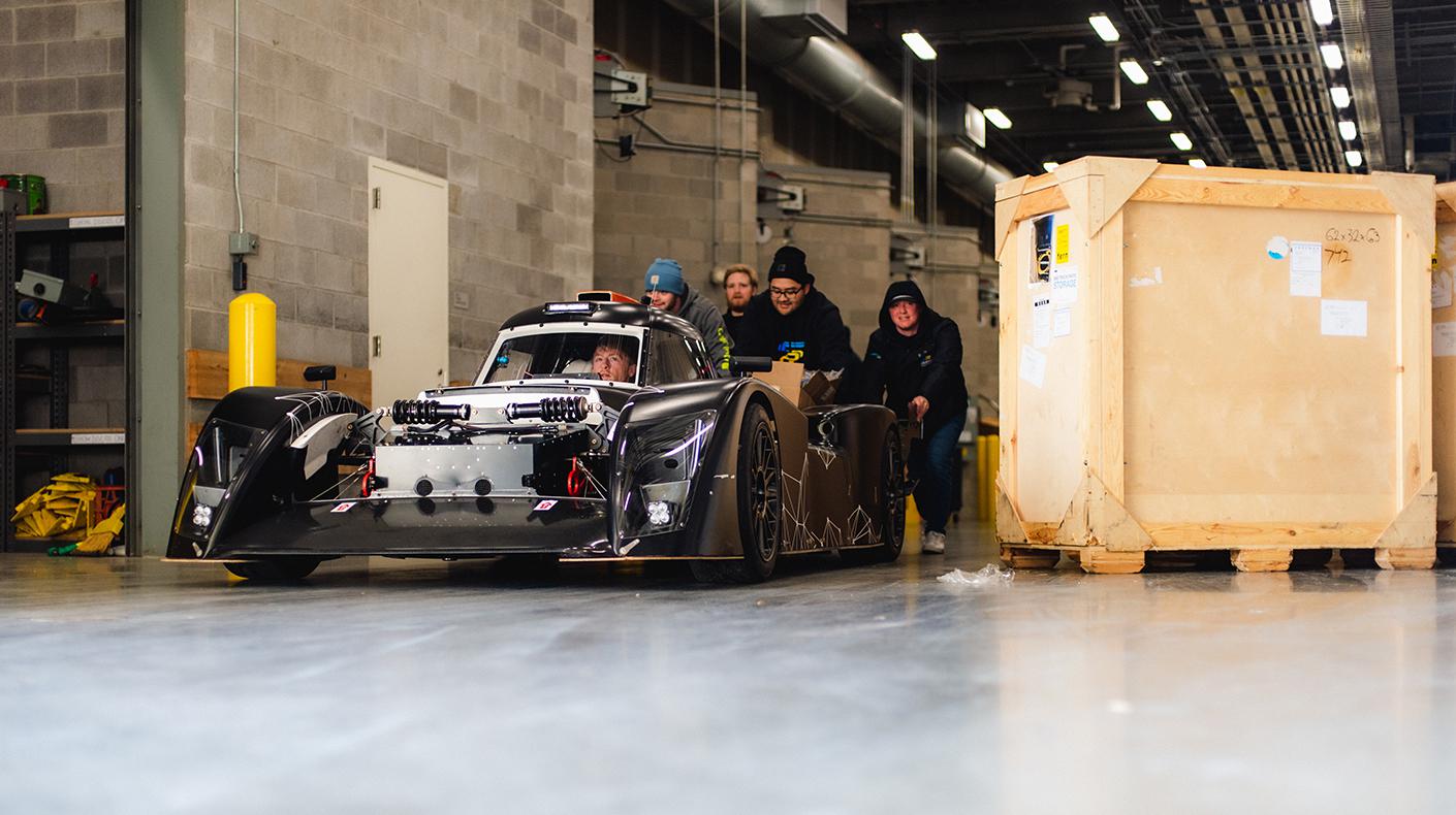 PRI Show exhibitors loading in a vehicle.