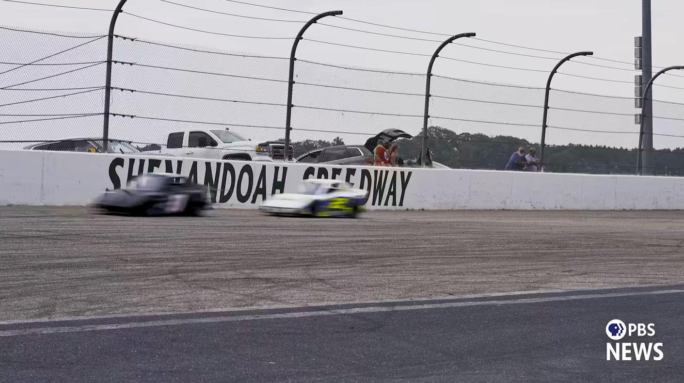 Shenadonah Speedway in VA cars on track. Courtesy of PBS News Hour and YouTube.