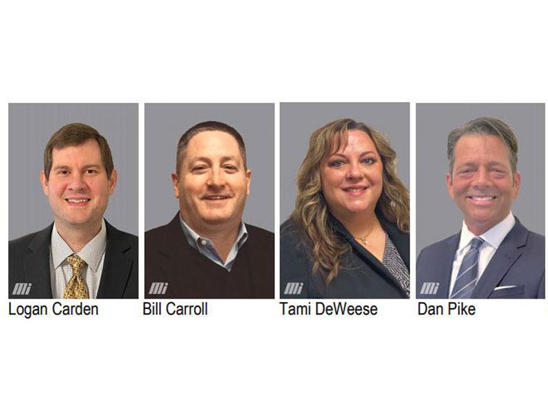 Headshots of Motion's seven recent promotions