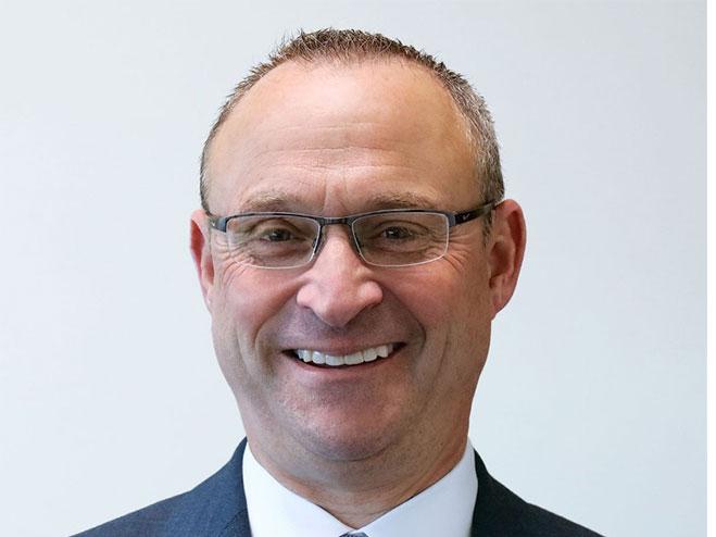 Headshot of Michael Buffamonti, new Dynabrade CEO, and Dynabrade logo