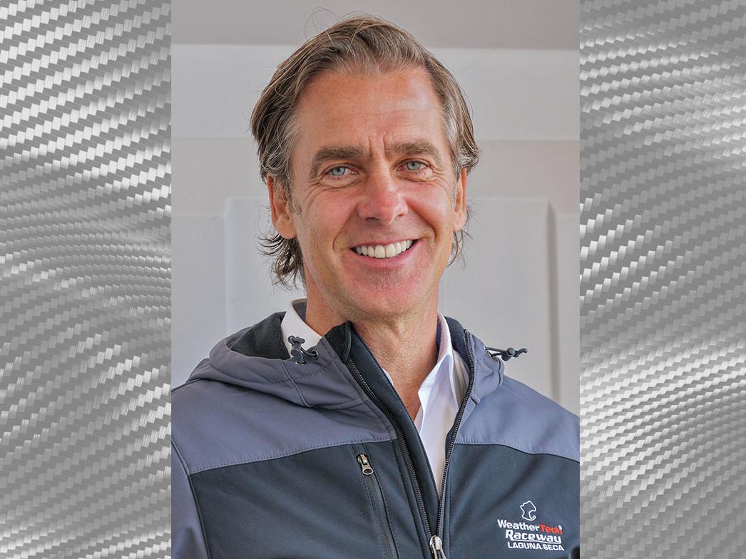 Mel Harder headshot image on carbon fiber background