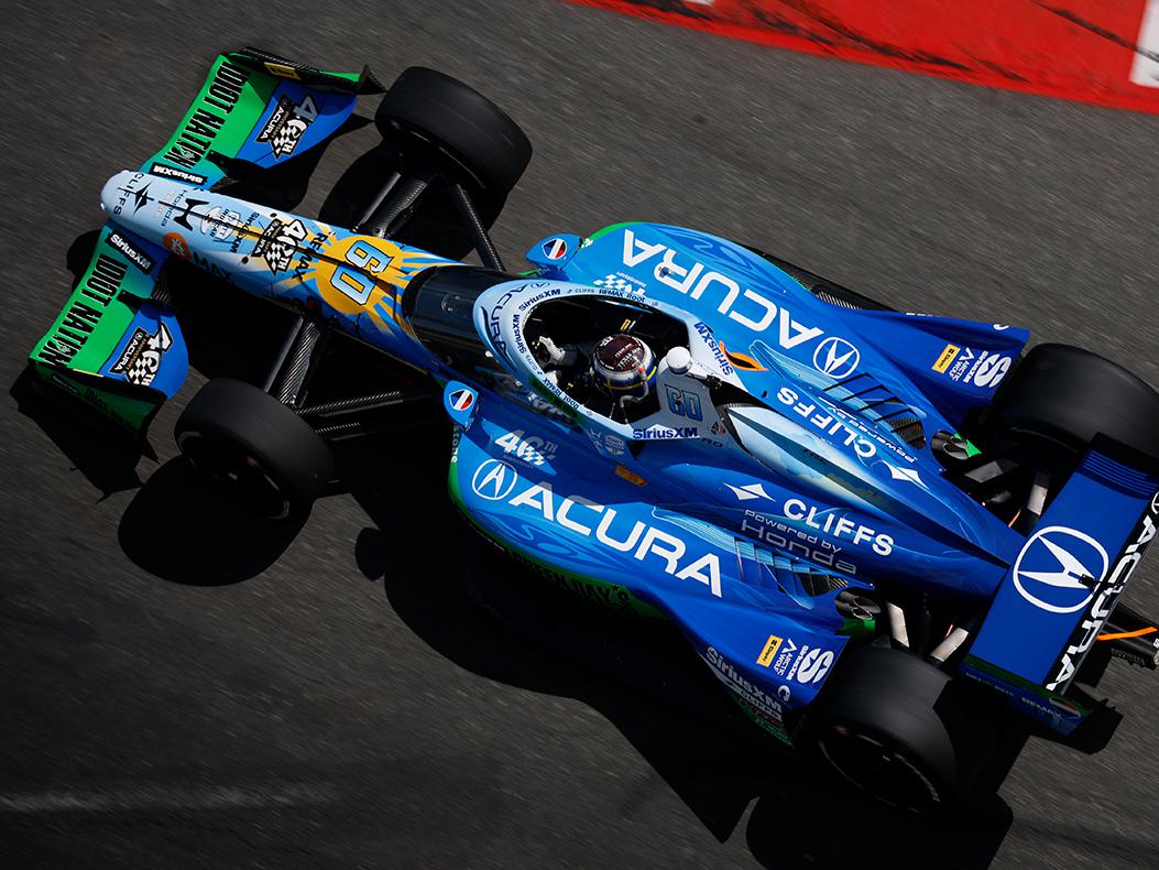 Felix Rosenqvist driving an Acura-branded INDYCAR.