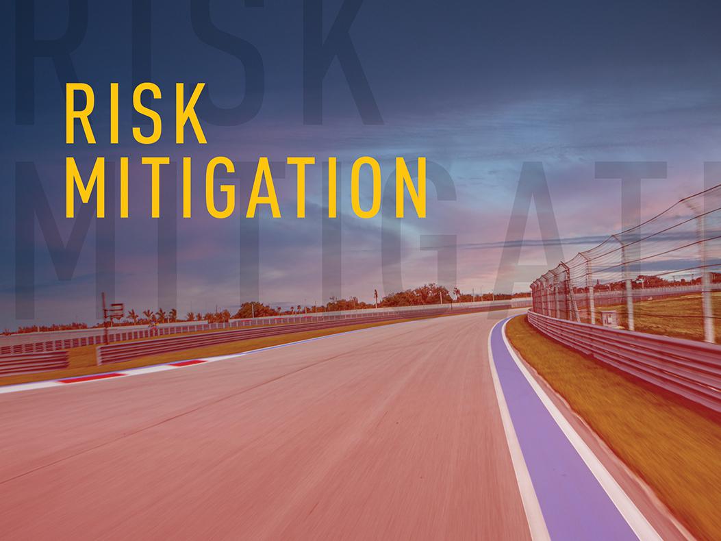 Risk Mitigation over an image of a race track.