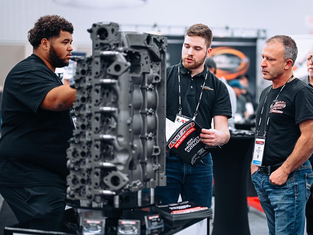 Attendees looking at products at the PRI Show.