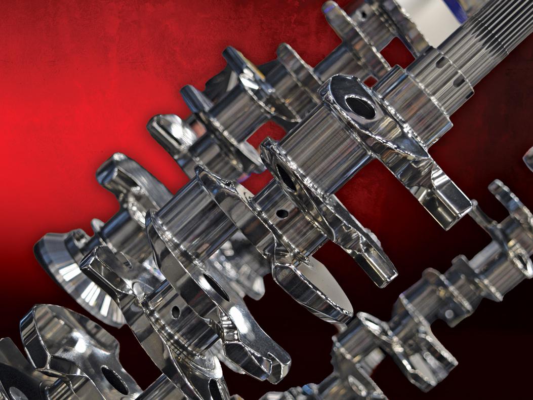 Motorsports crankshafts and a textured background.